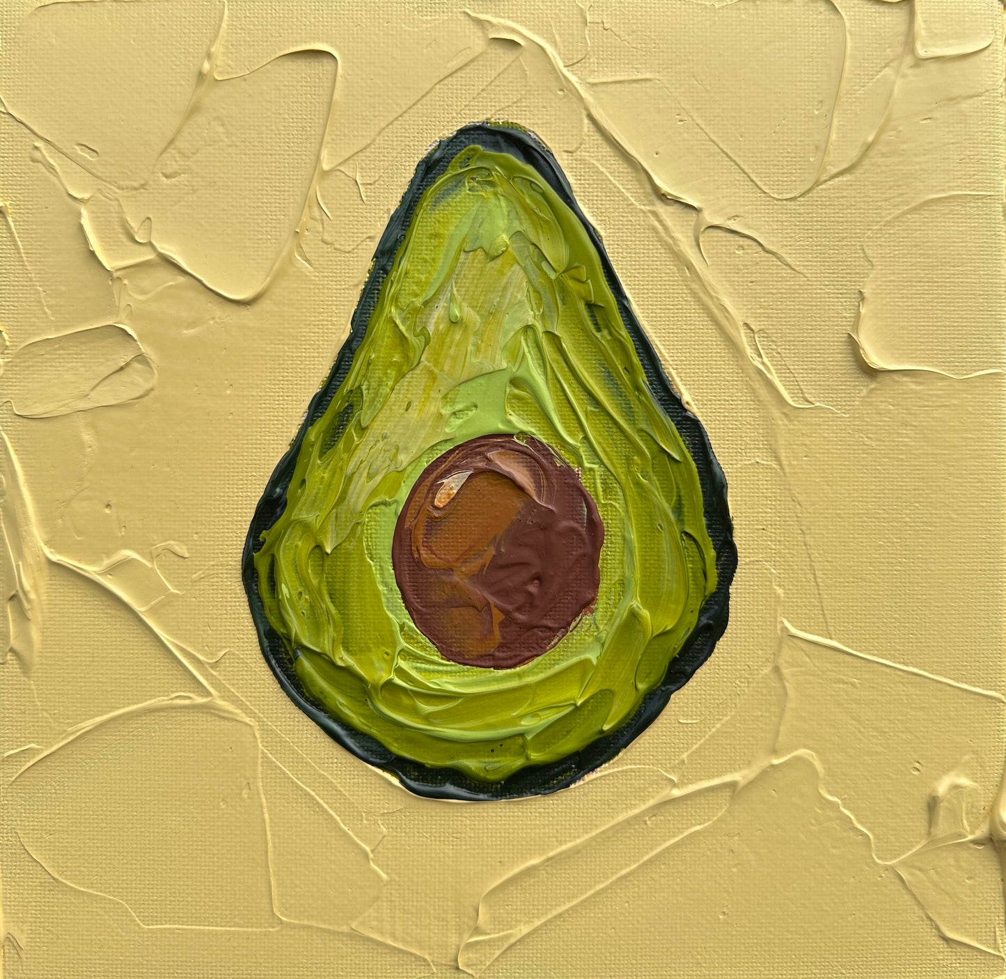 Painting of an avocado on a textured beige background