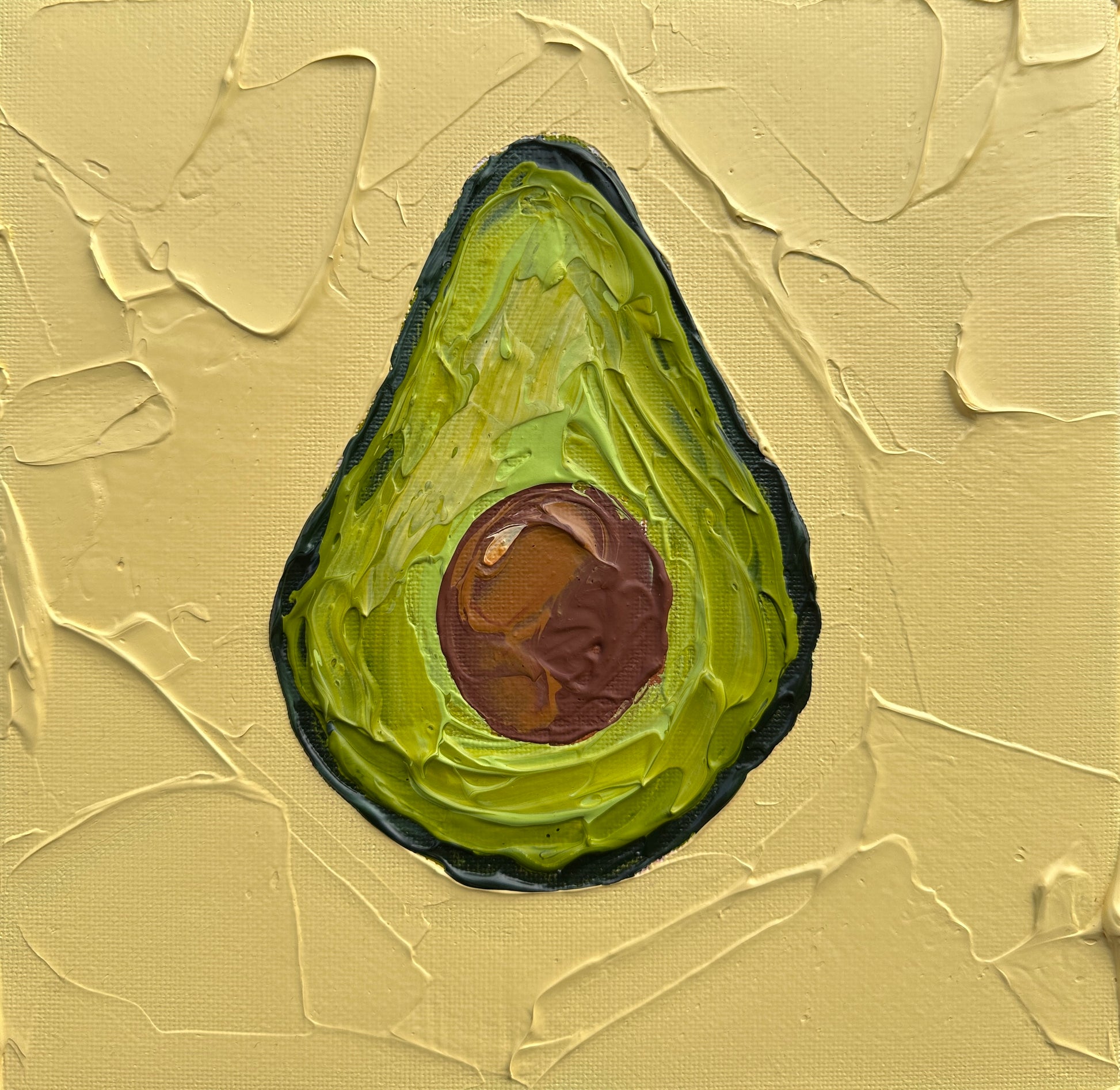 Painting of an avocado on a textured beige background