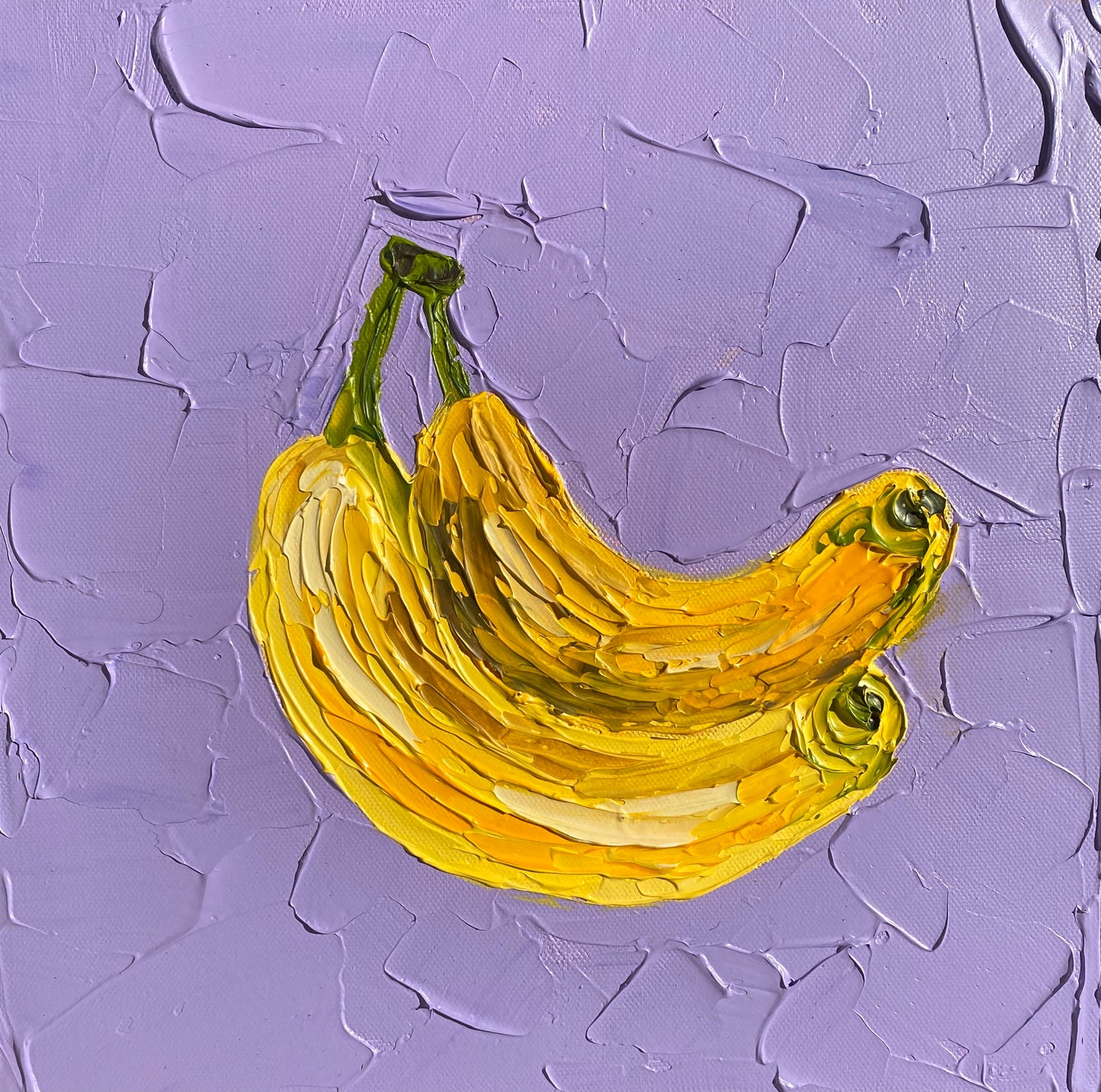 Painted bananas on a textured purple background