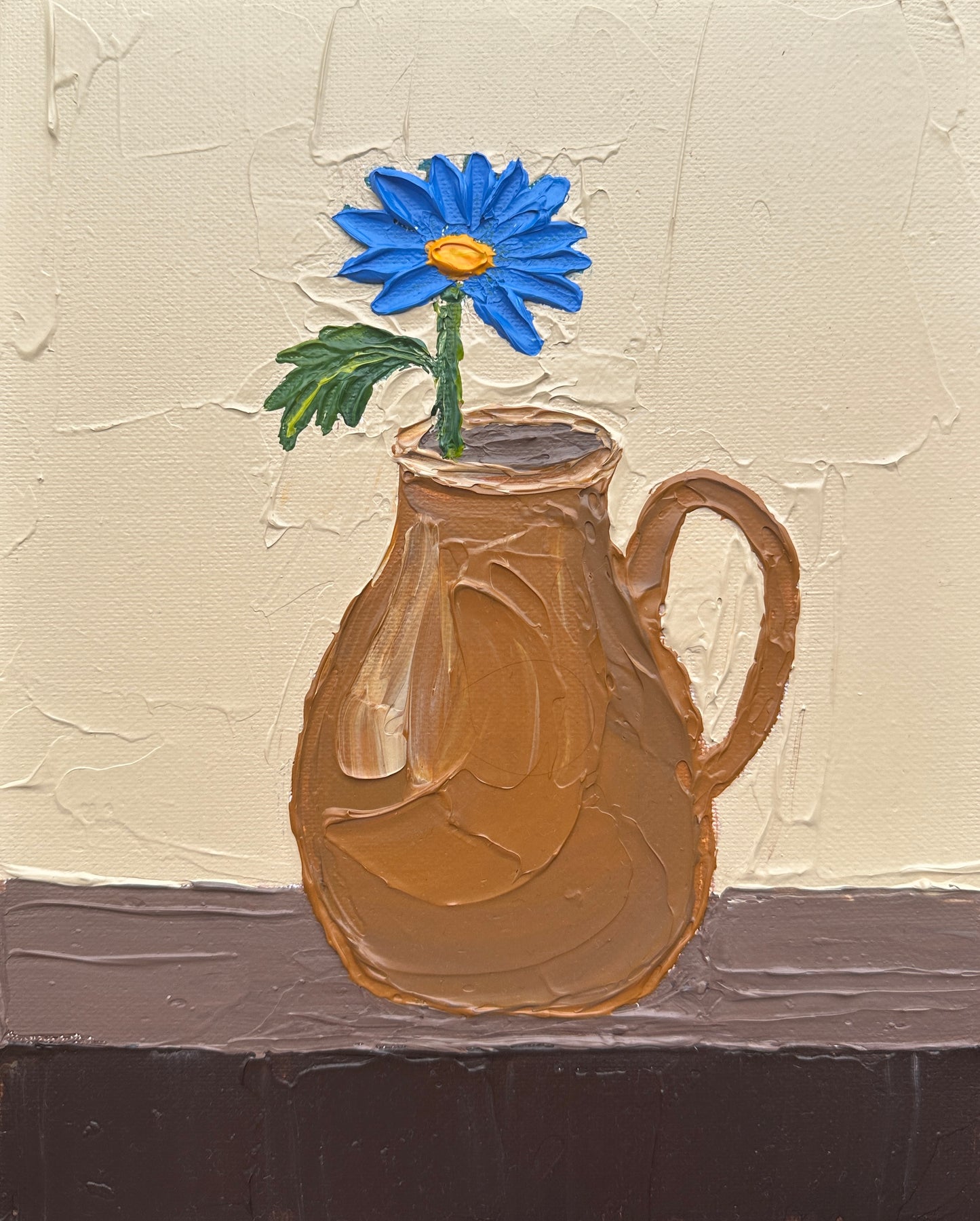 Painting of a brown pitcher with a blue flower on a textured beige background