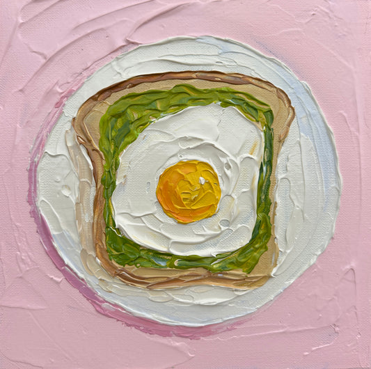 Artistic depiction of toast with avocado and a fried egg on a pink background