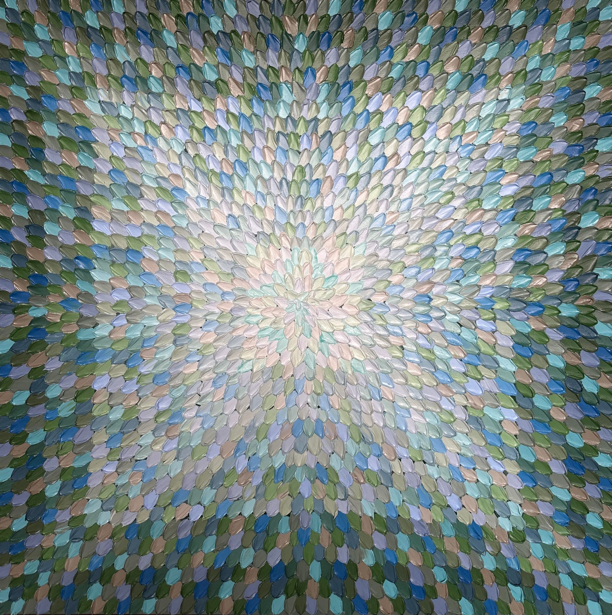 A geometric abstract painting with a textured surface featuring a variety of colors including blue, green, and white.