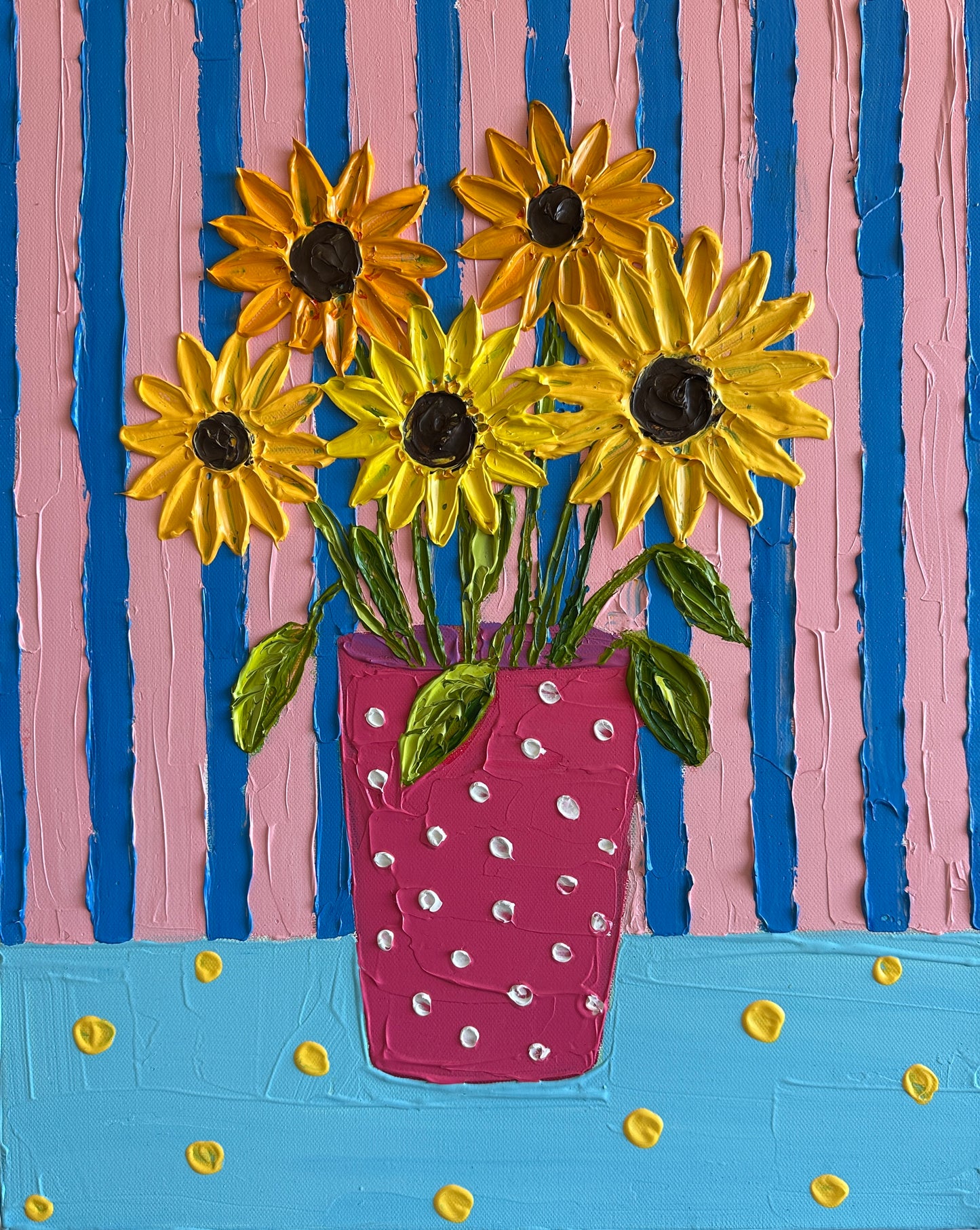 Artistic depiction of sunflowers in a polka dot vase against a striped background