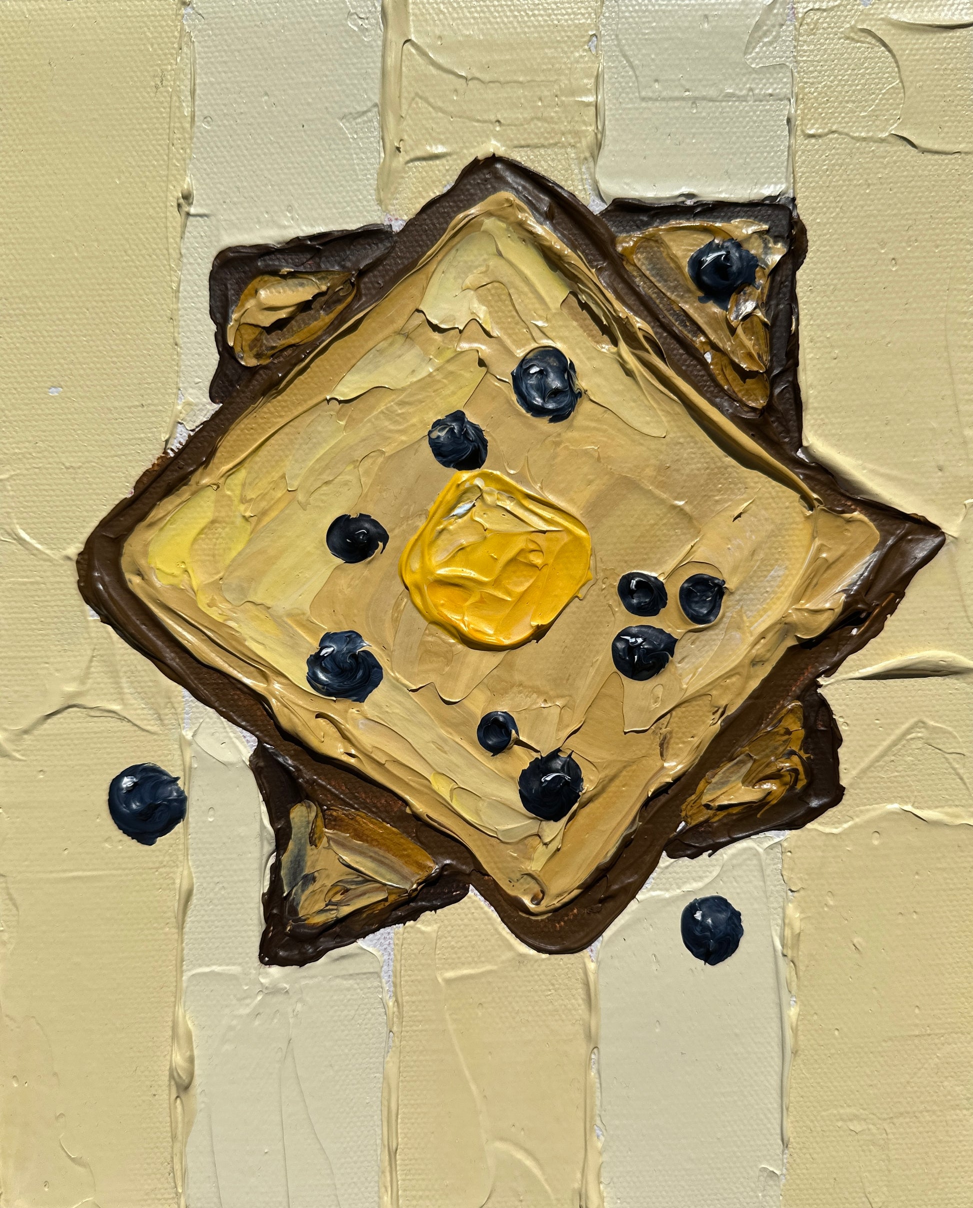 Artistic depiction of a square piece of toast with butter and blueberries on a textured beige background
