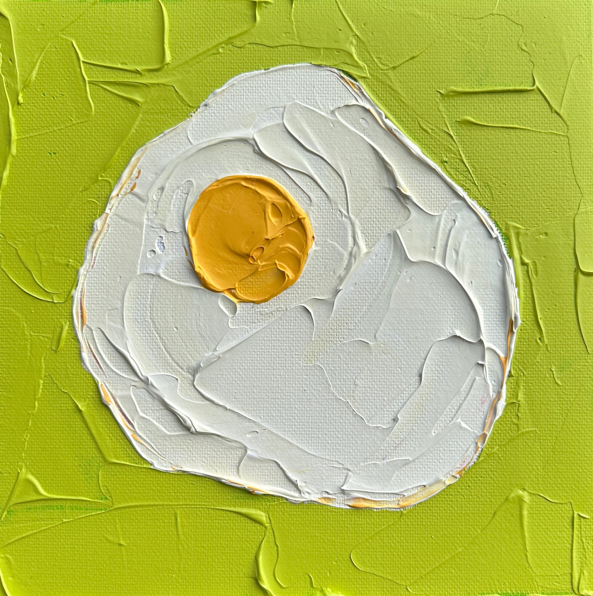 Artistic depiction of a fried egg with a textured green background